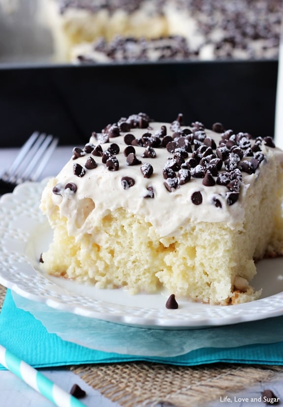 Cannoli Poke Cake - vanilla cake topped with cannoli filling icing!