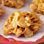 Soft and Chewy Caramel Clusters on red plate close up