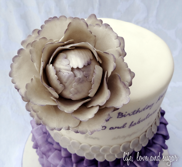 The Purple and White Flower on Top of my Mom's 60th Birthday Cake