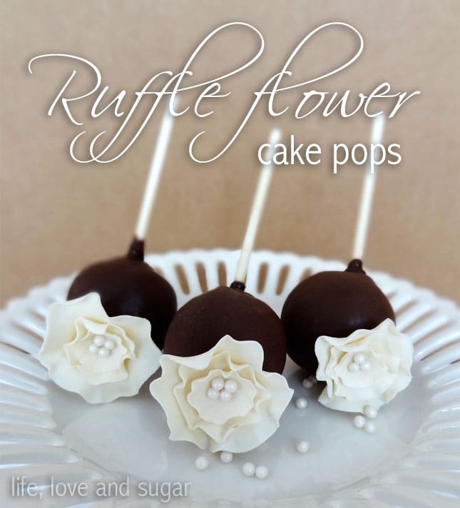 Tutorial: Ruffle fantasy flower cake pops image of three Ruffle Fantasy Flower Cake Pops on white plate