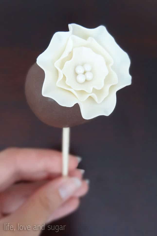 close up image of one Ruffle Fantasy Fondant Flower Cake Pop