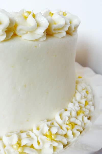 image of side of Lemon Cake with buttercream flowers