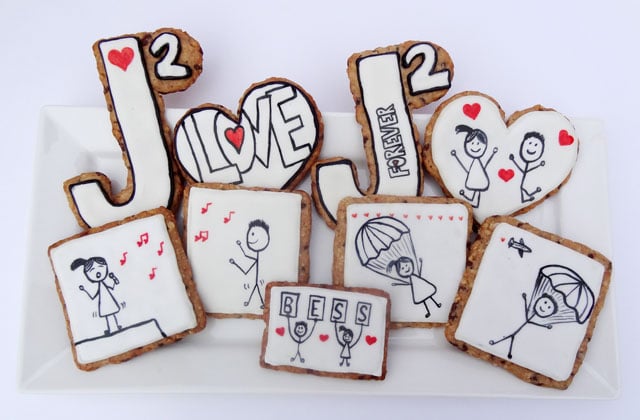 Decorated Oatmeal Wedding Cookies on a Plain White Plate