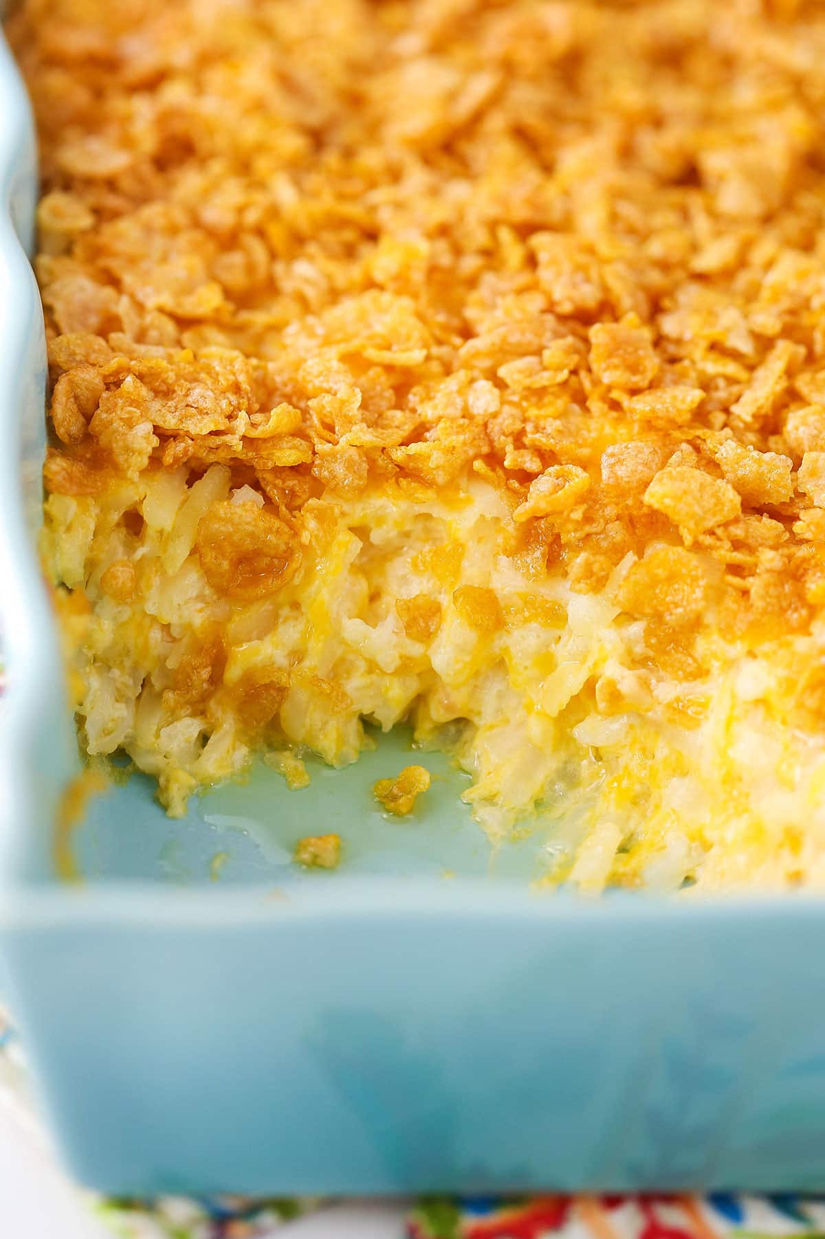 Baking dish full of hashbrown casserole.