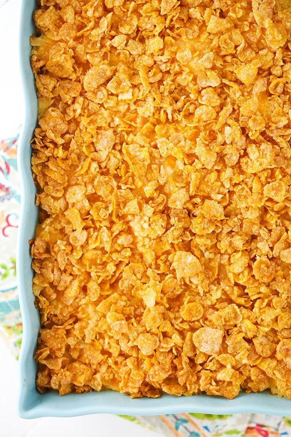 An overhead shot of the Frosted Flakes topping over the casserole in a baking dish