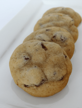 Sally's cookies stacked on white plate