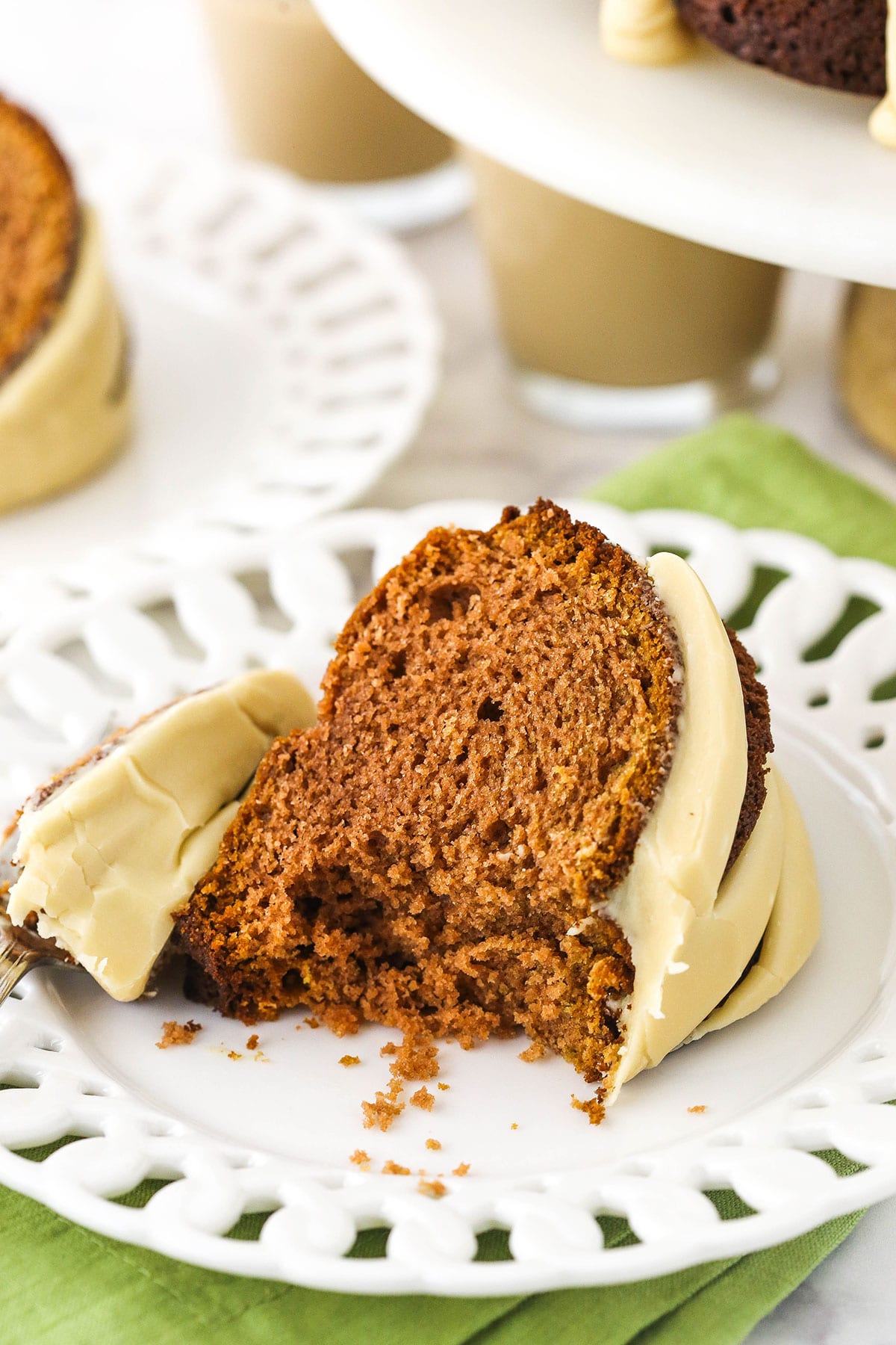 slice of Baileys Irish Cream Bundt Cake with a bite taken out