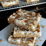 Cinnamon Sugar Crunch Bars stacked on wax paper