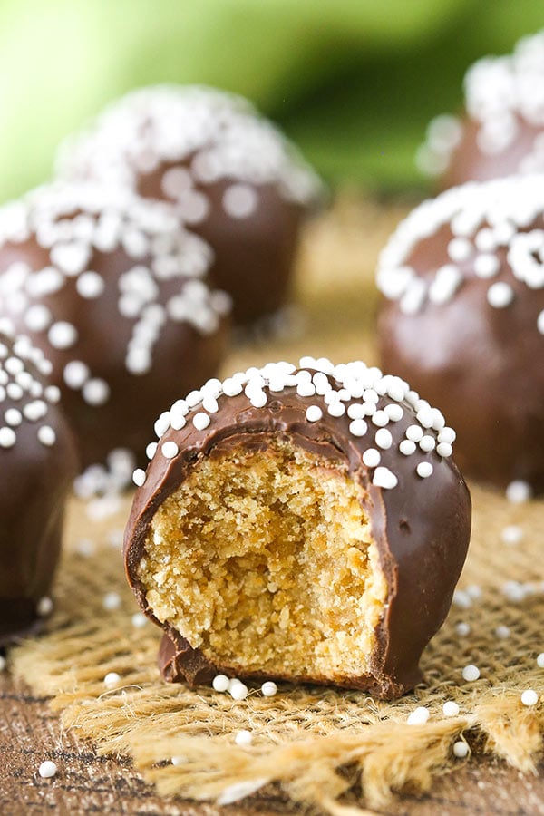 A close-up shot of an Irish Cream cookie ball on top of a wicker placemat