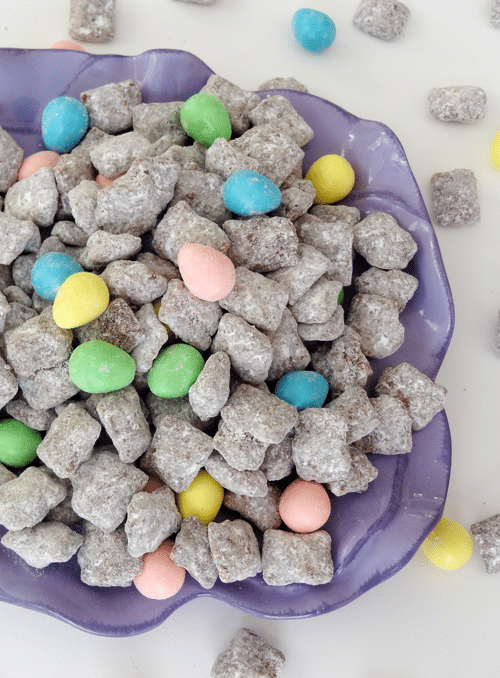 Reese's Easter Eggs and Puppy Chow in a purple bowl