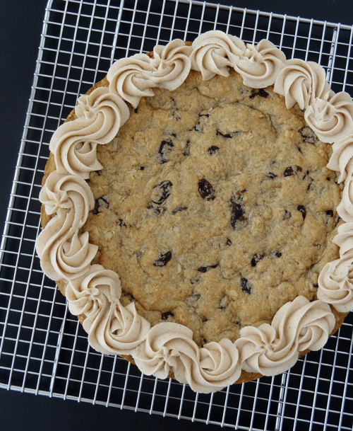 Thick and Chewy Oatmeal Raisin Cookie Cake! With Cinnamon Maple Icing!