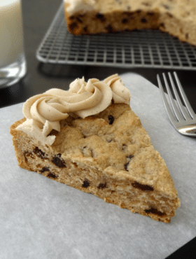 Thick and Chewy Oatmeal Raisin Cookie Cake With Cinnamon Maple Icing slice