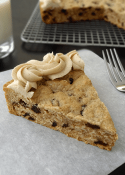 Thick and Chewy Oatmeal Raisin Cookie Cake With Cinnamon Maple Icing slice