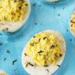 Traditional Deviled Eggs on blue plate