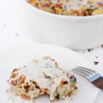 Funfetti Cake Batter Cinnamon Roll Casserole on white plate