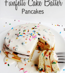 Funfetti Cake Batter Pancakes stack with bite cut out