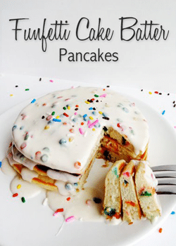 Funfetti Cake Batter Pancakes stack with bite cut out