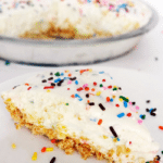 Funfetti Cake Batter Ice Cream Cake slice on white plate