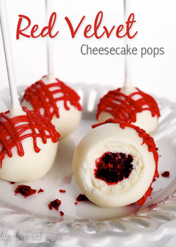 A Red Velvet Cheesecake Pop with a Bite Taken Out to Reveal the Red Velvet Cake and Cheesecake Inside