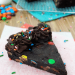 Triple Chocolate Cookie Cake slice on wax paper