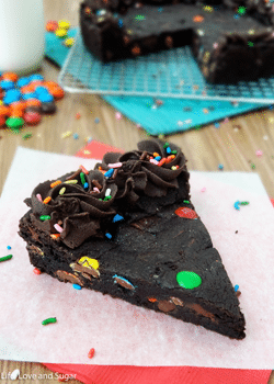 Triple Chocolate Cookie Cake slice on wax paper