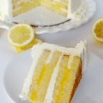 Triple Lemon Cake slice on white plate