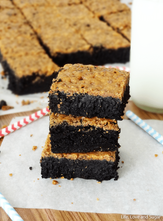Three stacked fudgy Brownies with Butterfinger crust