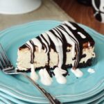 A Slice of Kahlua Ice Cream Pie on a blue plate