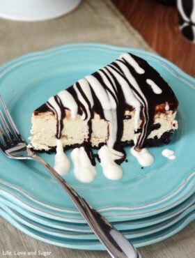 Kahlua Ice Cream Pie slice on stacked blue plates close up