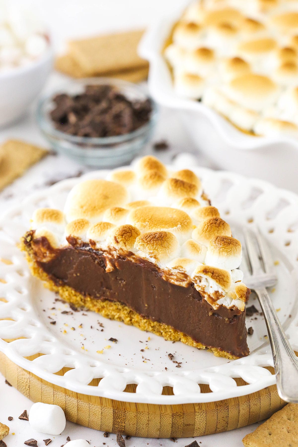 A slice of smore's chocolate pie on a white plate