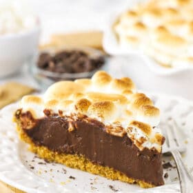 A slice of smore's chocolate pie on a white plate