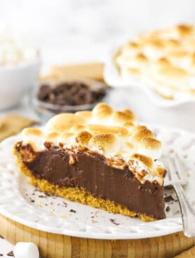 A slice of smore's chocolate pie on a white plate