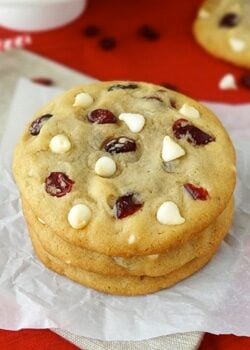 Cranberry white chocolate chip cookies stacked close up