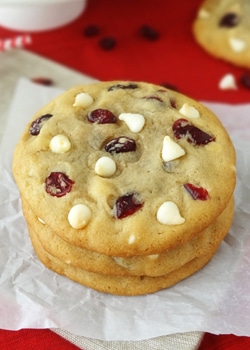 Cranberry white chocolate chip cookies stacked close up