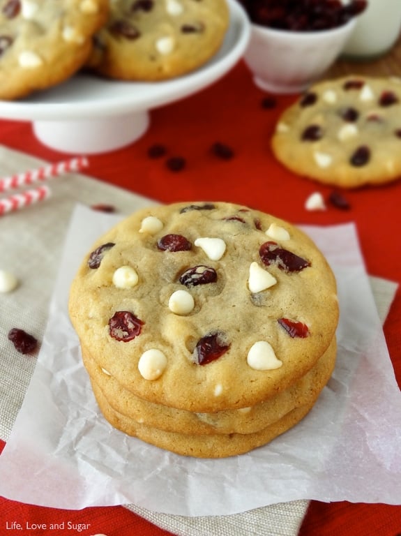 Stack of cranberry cookies with white chocolate chips.