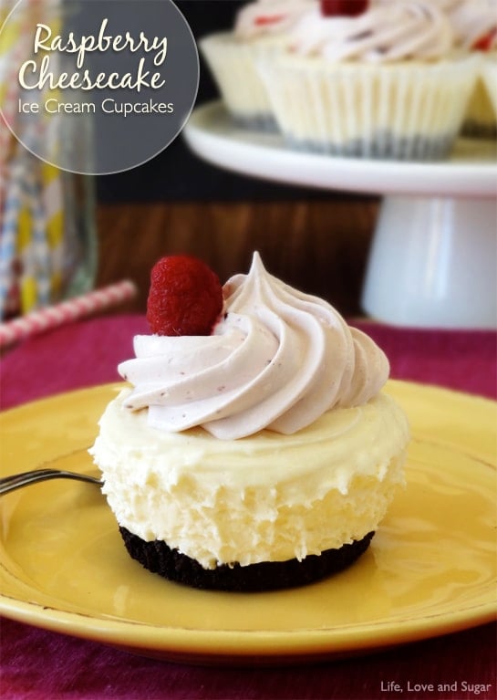 A Raspberry Cheesecake Ice Cream Cupcake and a fork sit on a yellow plate