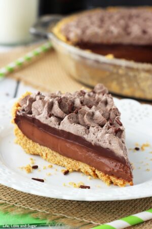 A slice of Baileys Chocolate Pie on a white plate