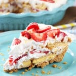 A slice of No Bake Strawberry Lemon Cookie Pie on a Plate