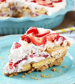 A slice of No Bake Strawberry Lemon Cookie Pie on a Plate