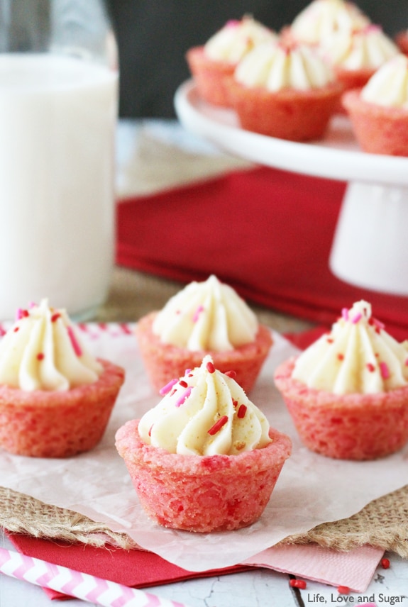 Strawberry Cheesecake Cookie Cups on white paper and burlap