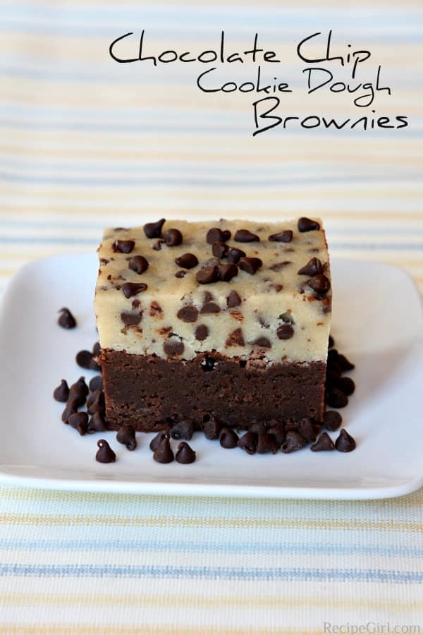 A Chocolate Chip Cookie Dough Brownie on a plate surrounded by mini chocolate chips.