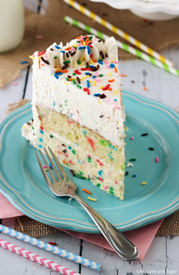 Funfetti Millionaire Cake - A layer of Funfetti cheesecake, Funfetti cake, and Funfetti mousse! 