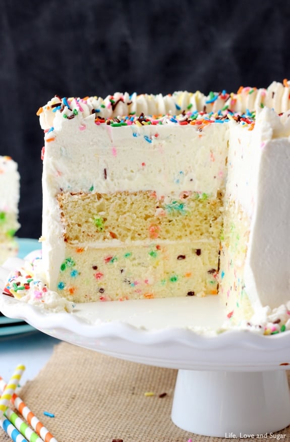 Funfetti Millionaire Cake - A layer of Funfetti cheesecake, Funfetti cake, and Funfetti mousse! 