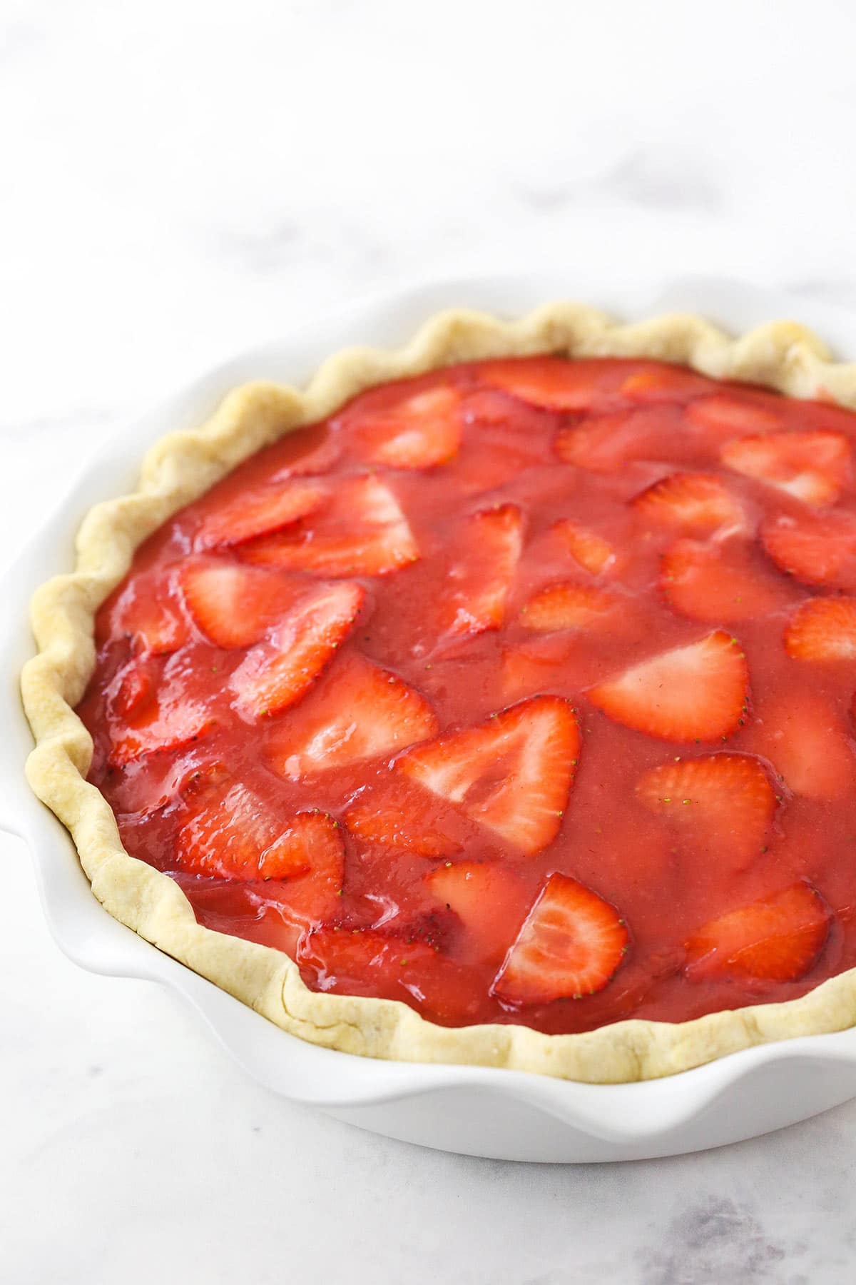 step 10 - strawberry glaze spread evenly on top of pie