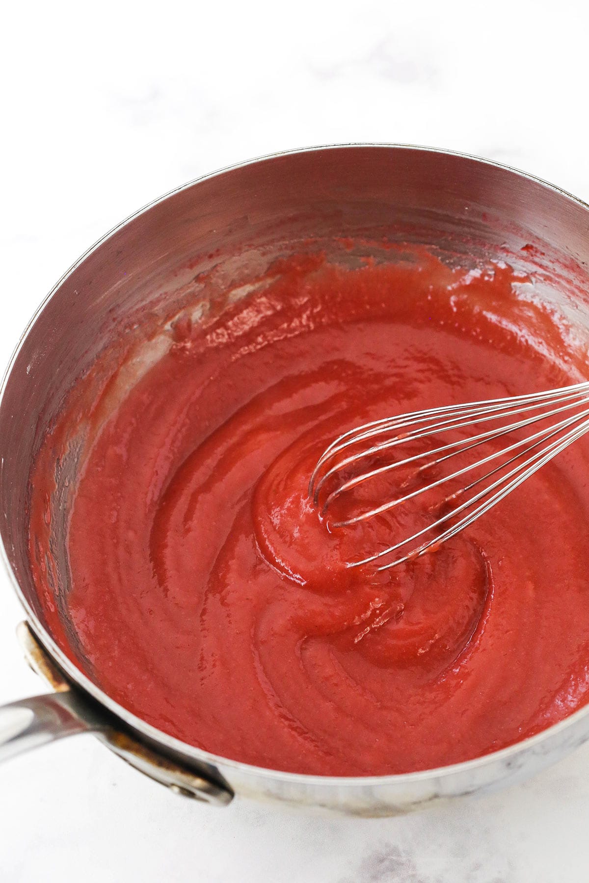 step 9 - cooked strawberry filling in saucepan