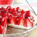 Strawberry Cream Pie in glass pie plate slice removed