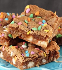 Carrot Cake Gooey Bars on blue stand