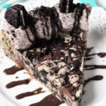 Oreo Cookies and Cream Cake slice on white plate