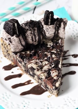 Oreo Cookies and Cream Cake slice on white plate