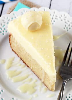 White Chocolate Truffle Cake slice on white plate overhead view